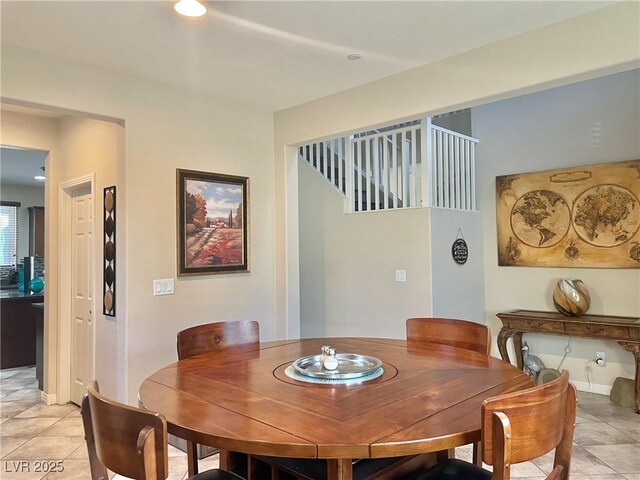 dining room with light tile patterned floors