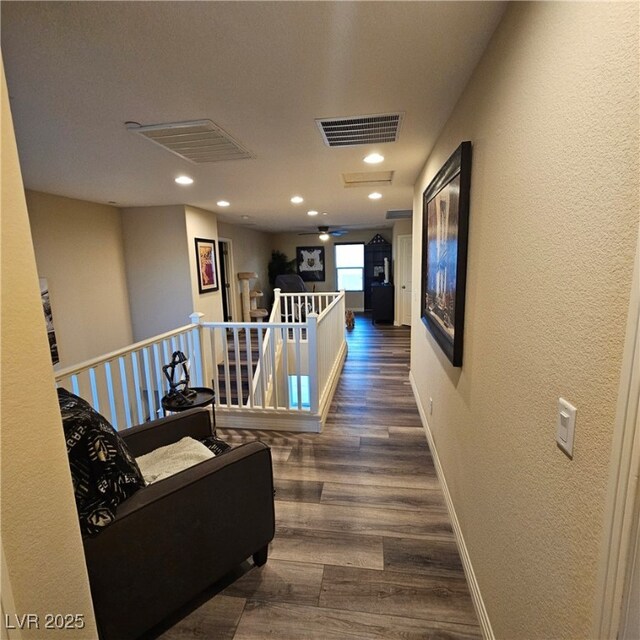 hallway featuring dark hardwood / wood-style flooring