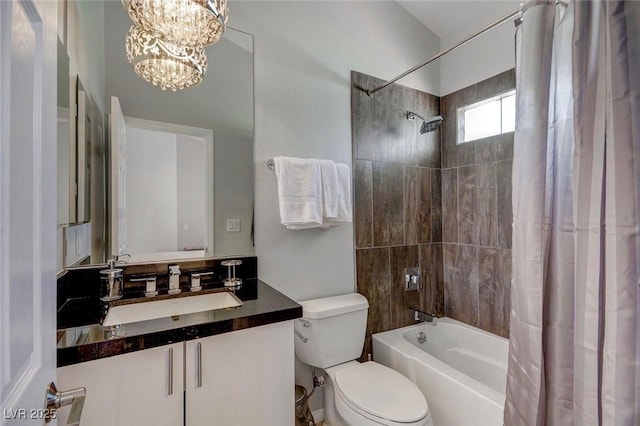 full bathroom featuring vanity, shower / bath combination with curtain, toilet, and an inviting chandelier