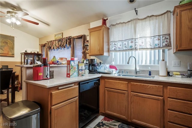 kitchen featuring light tile patterned flooring, lofted ceiling, black dishwasher, sink, and ceiling fan