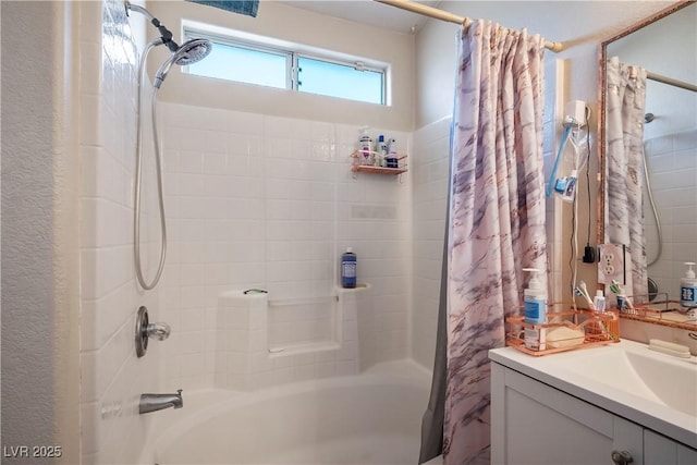 bathroom with shower / bathtub combination with curtain and vanity