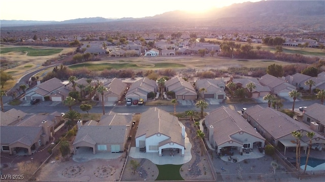 aerial view at dusk with a mountain view