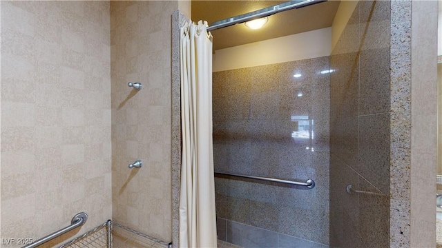 bathroom with a shower with shower curtain