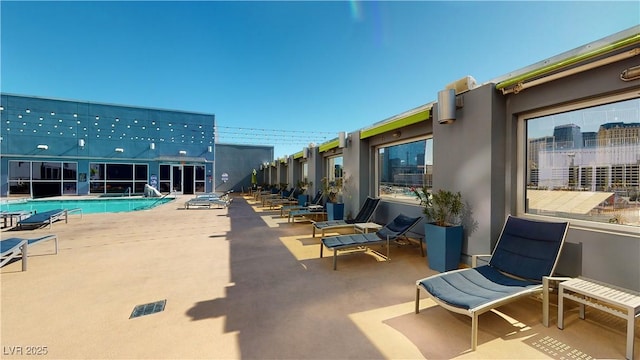 view of pool featuring a patio area