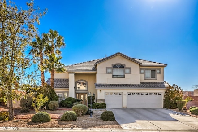 view of front of home with a garage