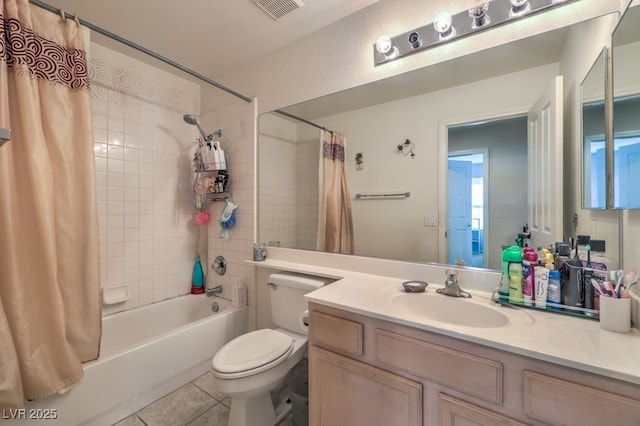 full bathroom featuring vanity, toilet, tile patterned flooring, and shower / bath combo with shower curtain