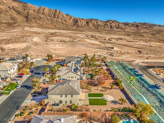 drone / aerial view featuring a mountain view