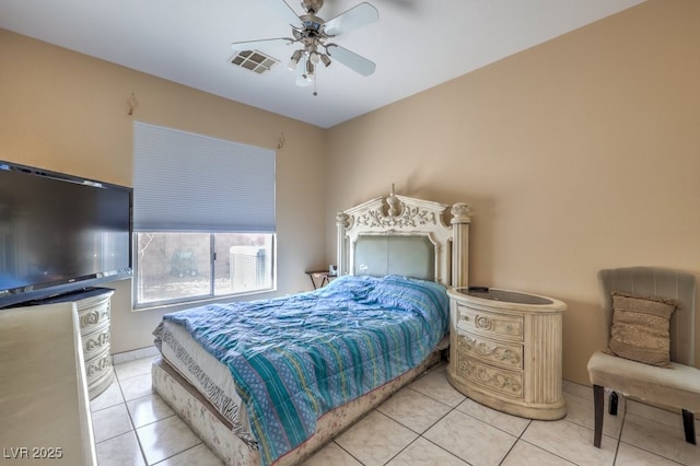 bedroom featuring ceiling fan and light tile patterned floors