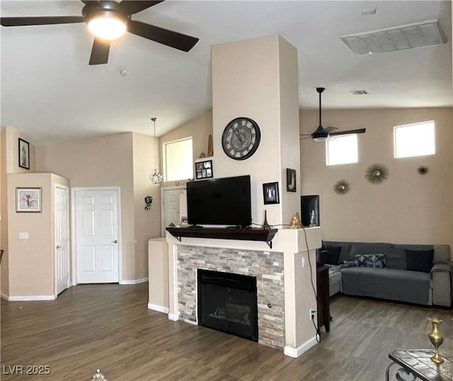 living room featuring ceiling fan, dark hardwood / wood-style flooring, high vaulted ceiling, and a fireplace