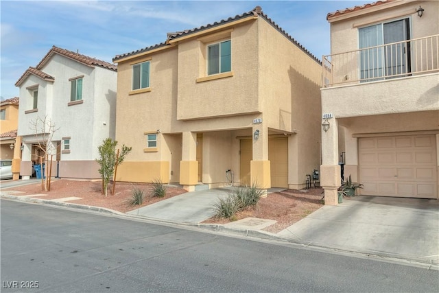 view of front of property with a balcony and a garage