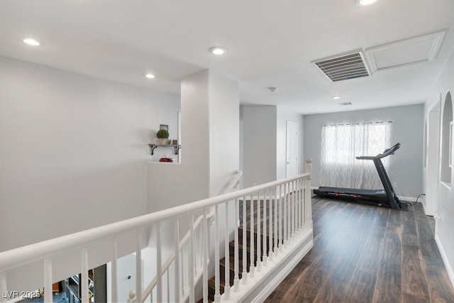 hallway featuring dark hardwood / wood-style flooring