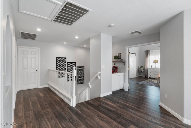 hall with dark hardwood / wood-style flooring