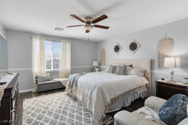 bedroom featuring dark wood-type flooring and ceiling fan