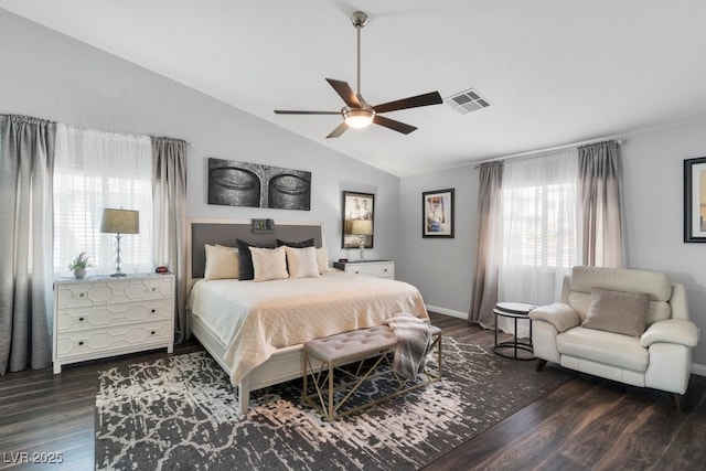 bedroom featuring lofted ceiling, dark hardwood / wood-style floors, and ceiling fan