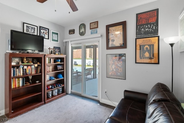 living room with ceiling fan