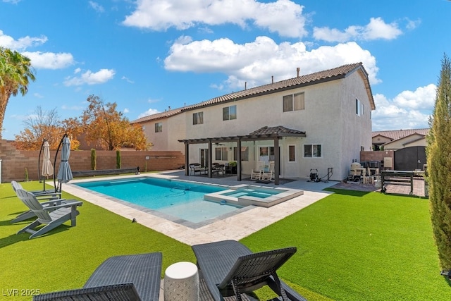 view of swimming pool featuring a yard, a pergola, a patio area, and an in ground hot tub