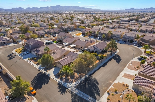 drone / aerial view featuring a mountain view