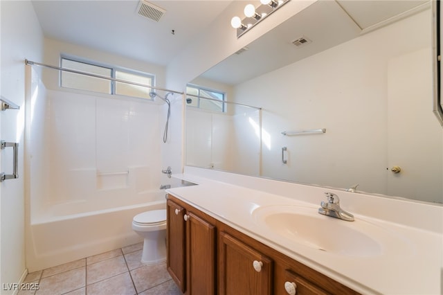 full bathroom with vanity, tub / shower combination, tile patterned floors, and toilet