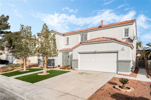 mediterranean / spanish-style house featuring a garage