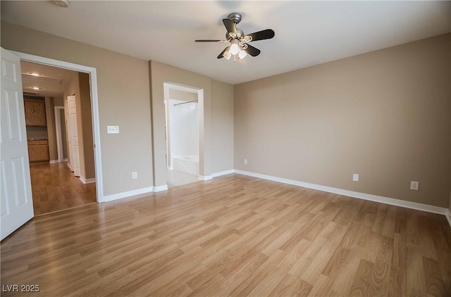 unfurnished bedroom featuring ceiling fan and light wood-type flooring