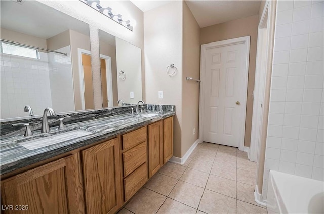 bathroom with vanity and tile patterned flooring