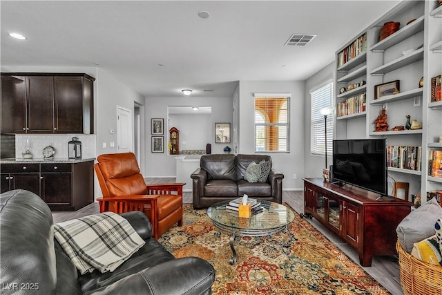 living room with light hardwood / wood-style floors