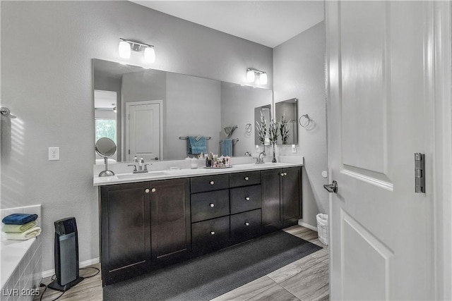 bathroom featuring vanity and hardwood / wood-style floors