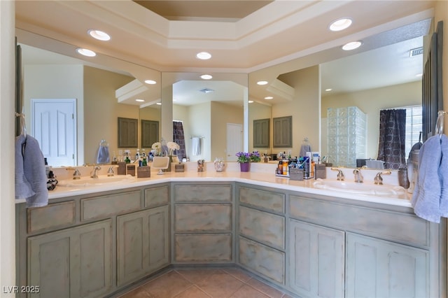 bathroom with tile patterned floors and vanity