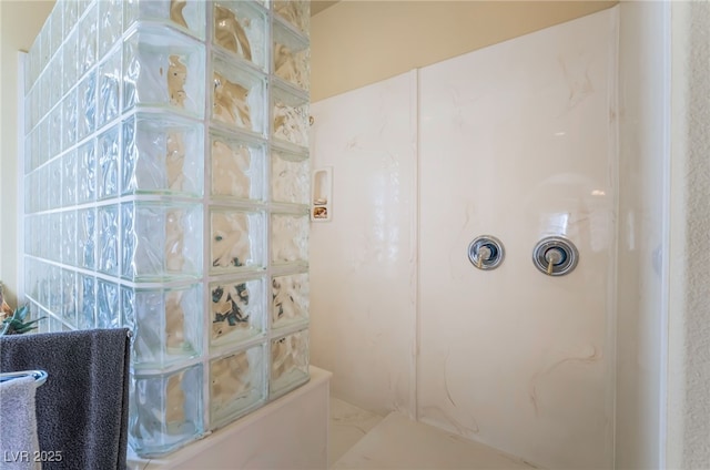 bathroom featuring walk in shower