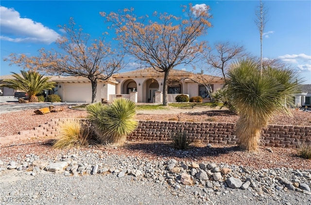 view of front of home featuring a garage and central air condition unit