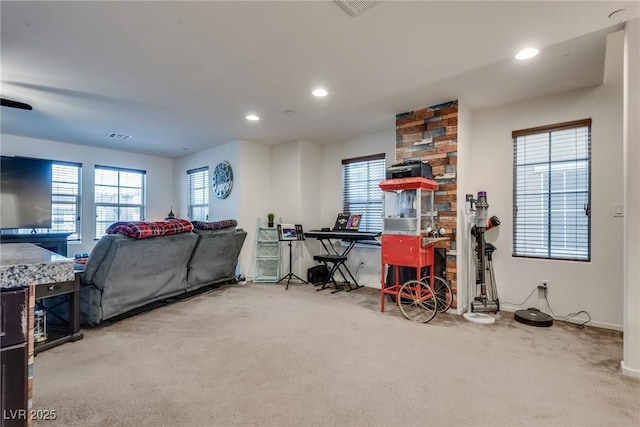 interior space featuring carpet floors and a wealth of natural light