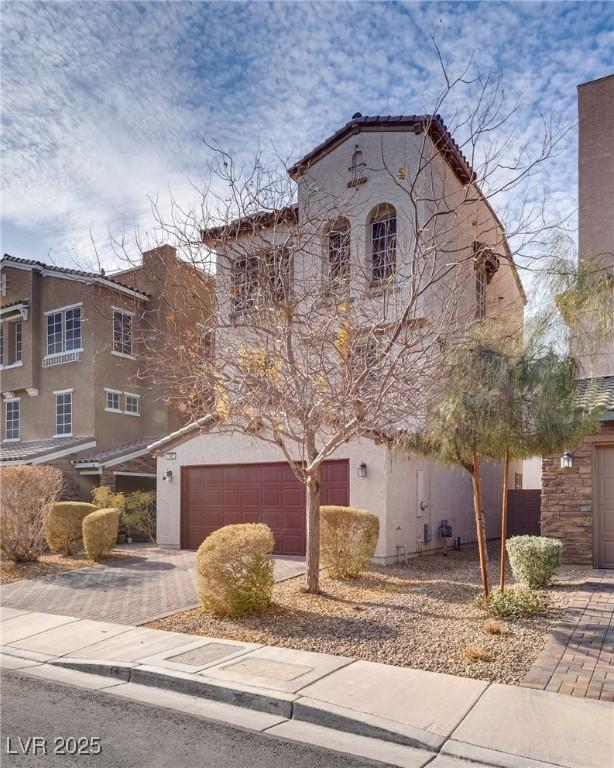 view of front of home with a garage