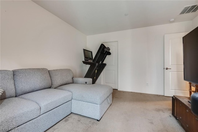 living room featuring light carpet