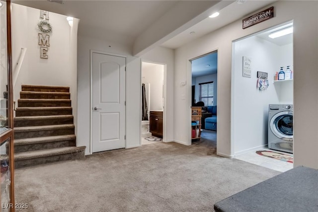 interior space with washer / dryer and carpet flooring