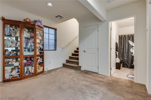 interior space with light colored carpet