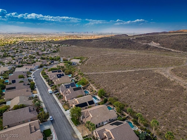 birds eye view of property with a residential view