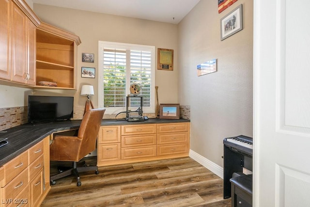 2012 Poetry Ave, Henderson, NV 89052 - office space featuring built in desk, baseboards, and wood finished floors