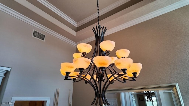 2012 Poetry Ave, Henderson, NV 89052 - room details with a chandelier, visible vents, and ornamental molding