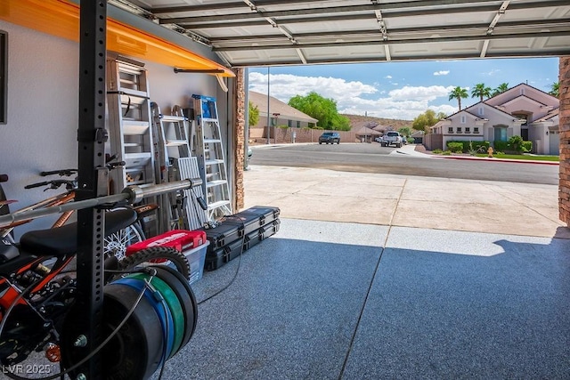 garage featuring a residential view