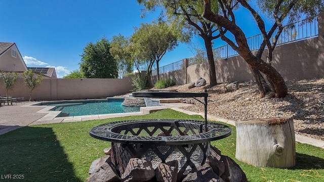 view of yard with a fenced backyard and a fenced in pool