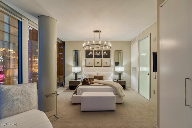 carpeted bedroom with an inviting chandelier