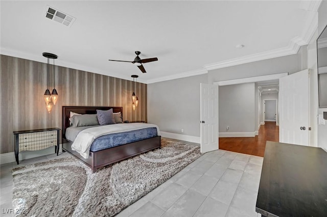 bedroom with ornamental molding and ceiling fan