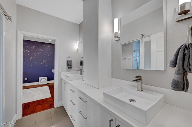 bathroom featuring vanity and tile patterned flooring