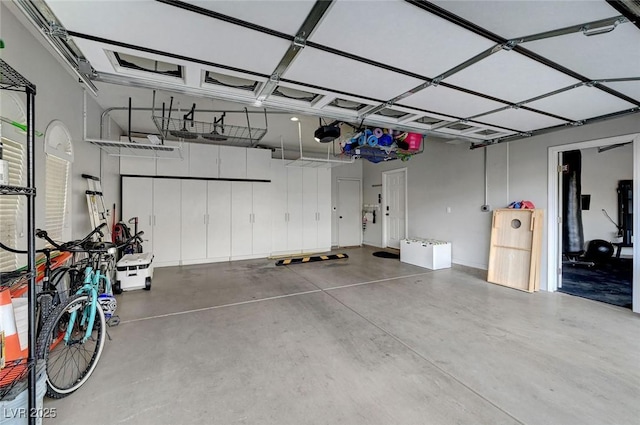 garage featuring a garage door opener