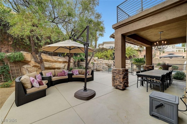 view of patio / terrace featuring outdoor lounge area and a balcony