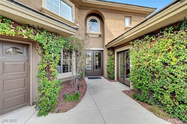 doorway to property with french doors