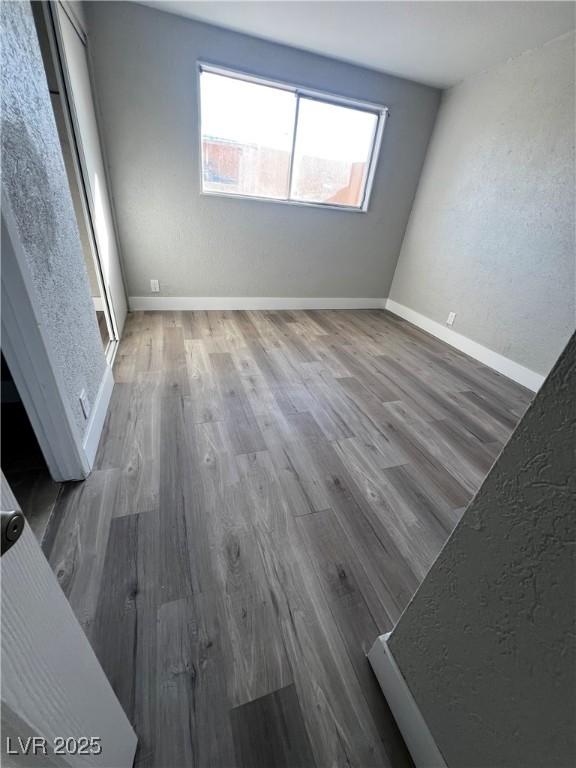 interior space with dark hardwood / wood-style flooring