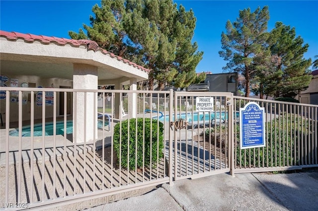 exterior space featuring a community pool