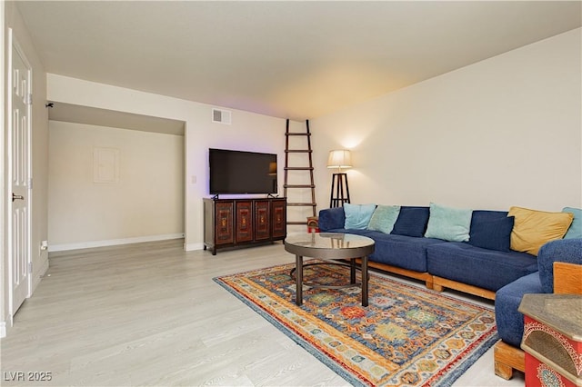 living room with hardwood / wood-style floors