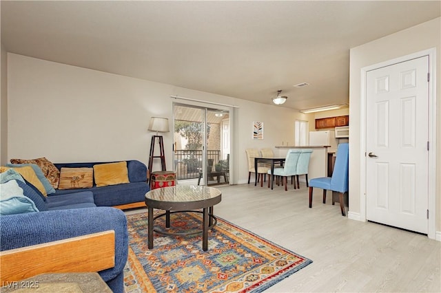 living room featuring light wood-type flooring